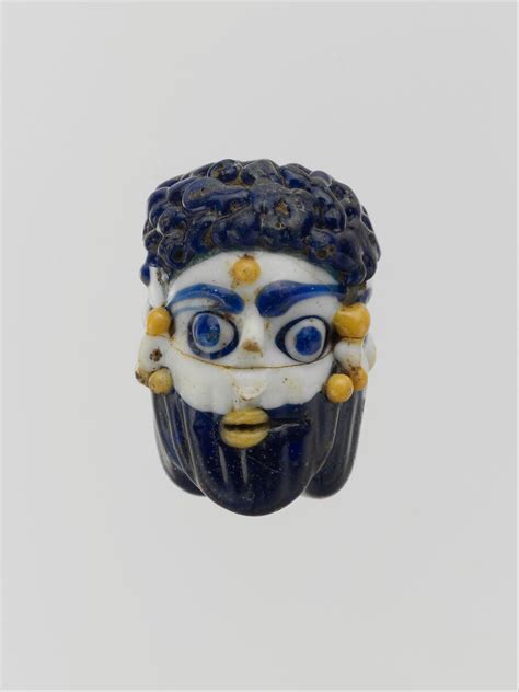 phoenician glass face.